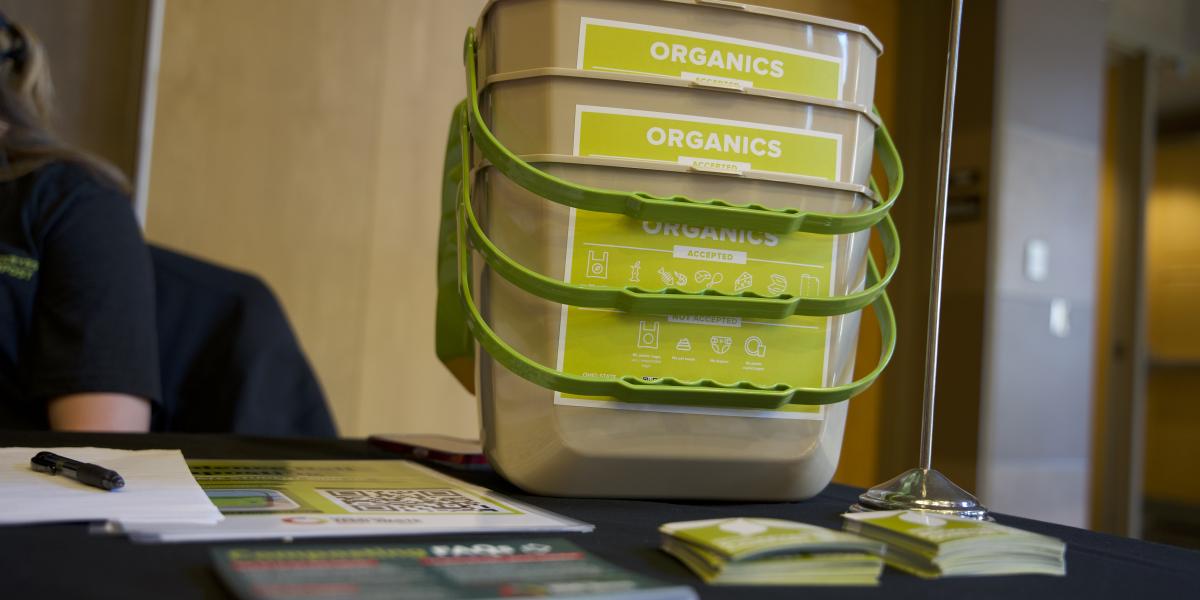 Compost buckets on table