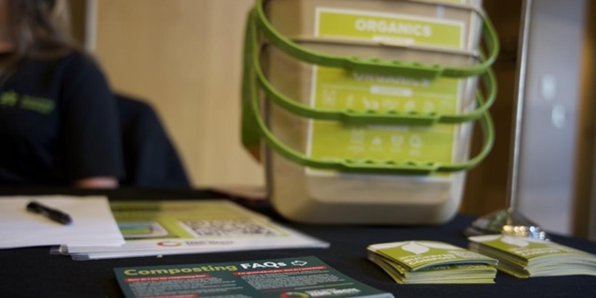 Compost buckets sitting on an event table