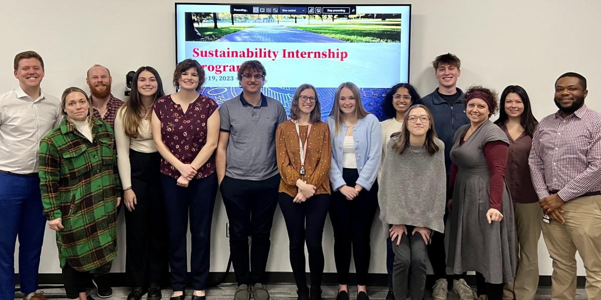 Interns and FOD personell pose for a photo before their presentation for FOD administrators.