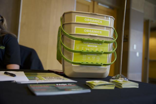 Compost buckets on table