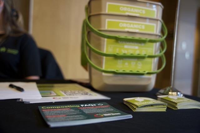 Compost buckets sitting on an event table