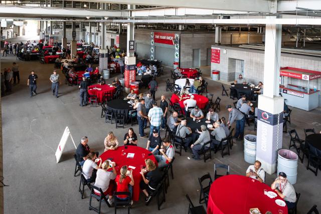 groups of people eating at their tables