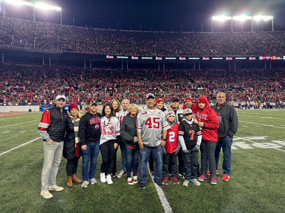 The sustainability team on the Ohio Stadium field