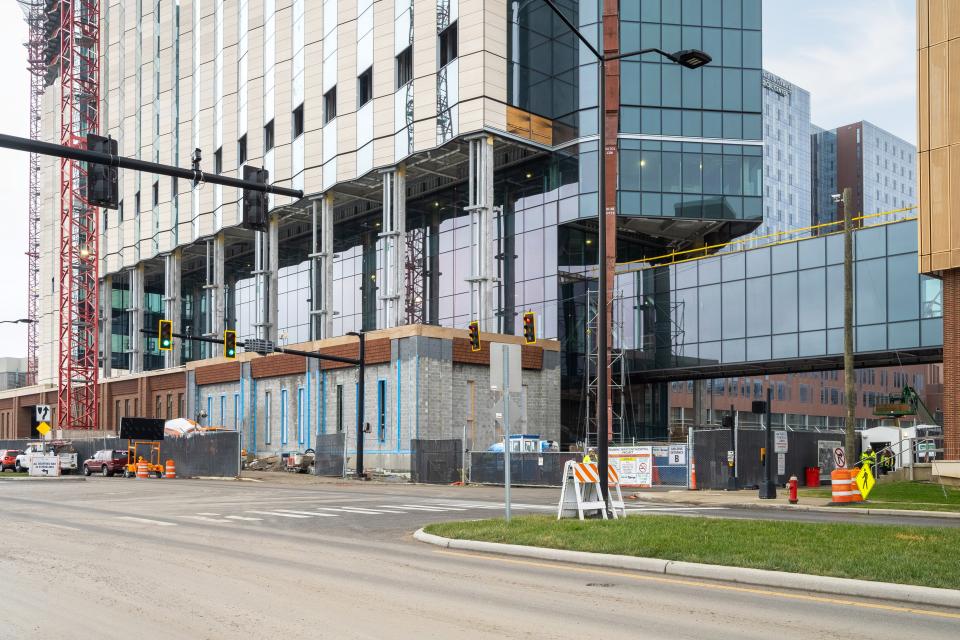 An exterior view of the South end of the building. The parking garage can be seen at the far right.