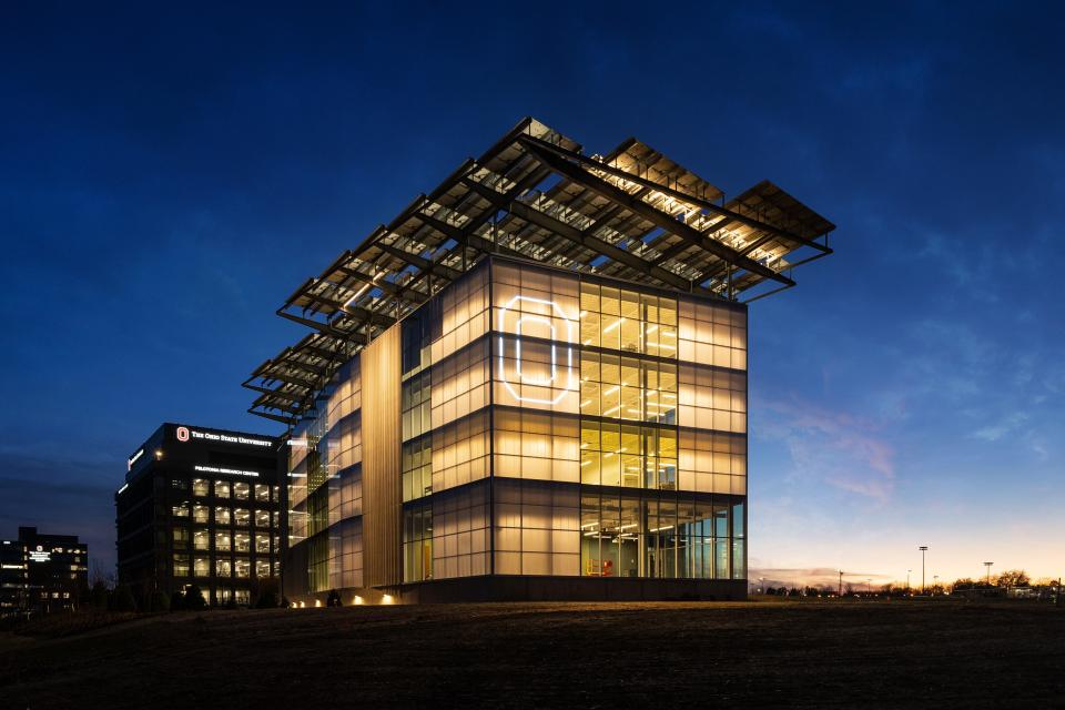EAIC exterior shown at night, with a lit up "block O'